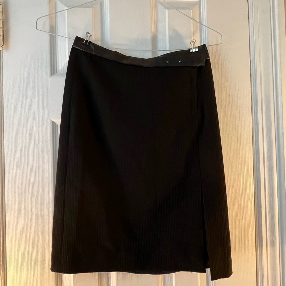 Black skirt mid length with slit
